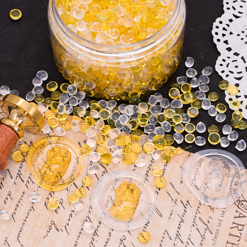 Peiren lágrima fuego pintura plástico grano transparente fuego pintura sello cera grano oro blanco mezclado color fuego pintura cera grano sellado sello de cera