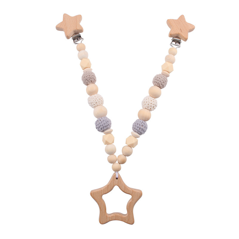 Nuevos productos para bebés abrazaderas de abrazaderas de haz de dibujos animados DIY pulsera de dientes molares decoración colgante de campana cuatro piezas