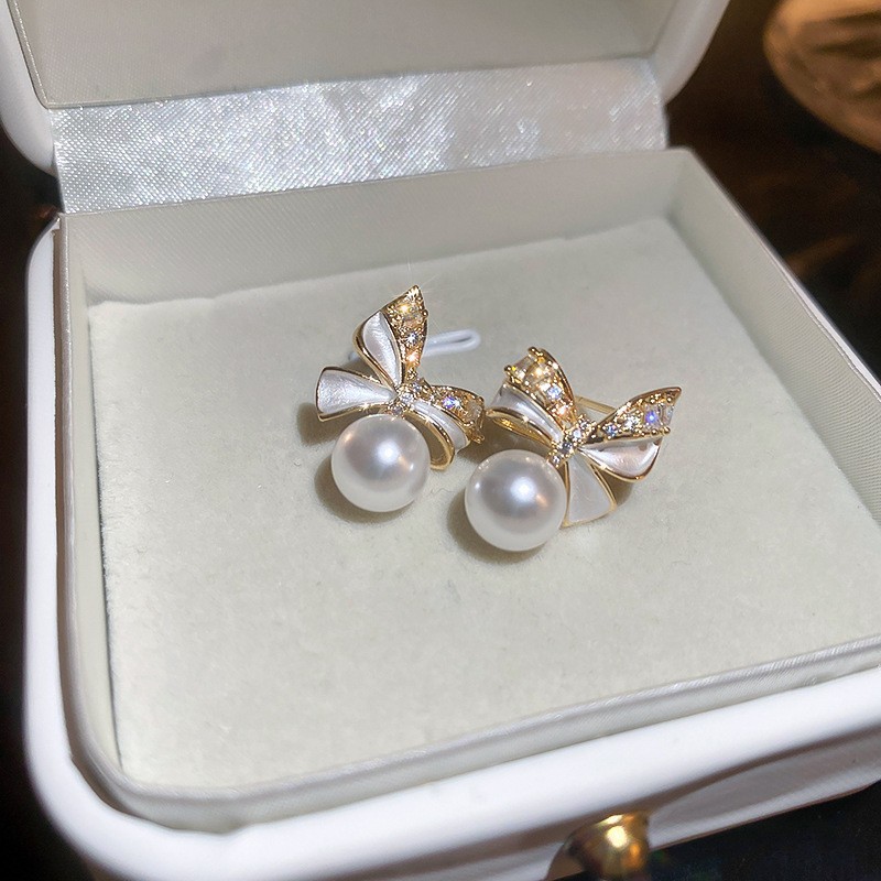 Aguja de plata flor pendientes geométricos pendientes dulces pequeños frescos de Corea del Sur ins moda nicho pendientes