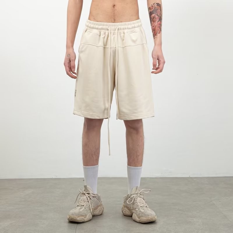 Nuevos pantalones cortos casuales para hombres, marca de moda ins, color sólido, color de contraste simple, pantalones deportivos de cinco puntos colgantes rectos sueltos casuales