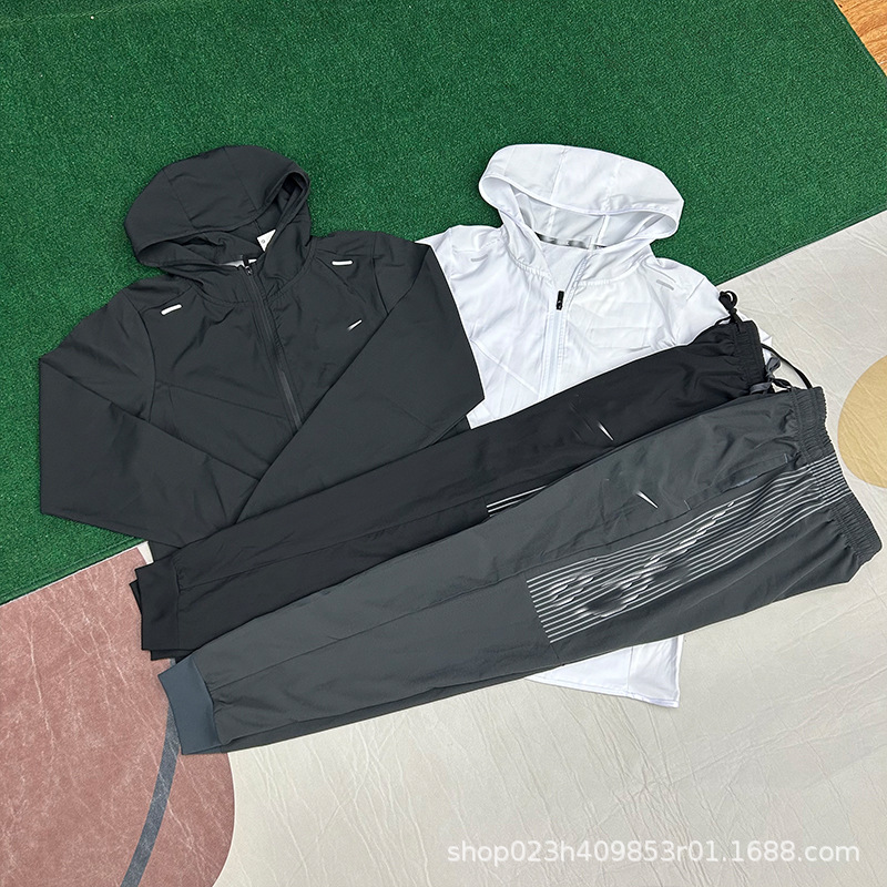 2025 nuevo conjunto de otoño y invierno pantalones de seda de secado rápido chaqueta deportiva con cremallera con capuchón protector solar para hombres y mujeres