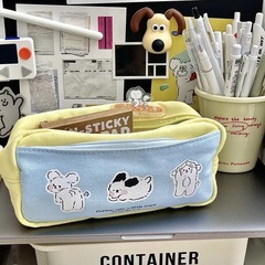 蘇さんは同じタイプの高颜値三匹の子犬の筆袋の学生の大容量のキャンバスのプリントの文房具の鉛筆の収納袋にいます。