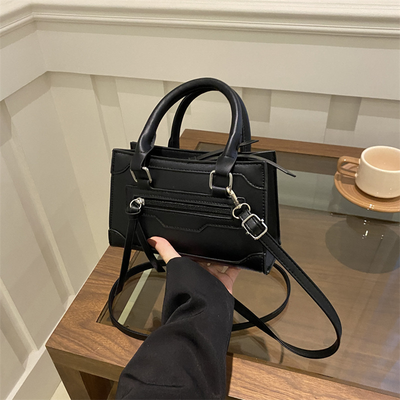 Bolso bolso femenino 2024 nuevo bolso de motocicleta retro de moda textura nicho todo fósforo bandolera