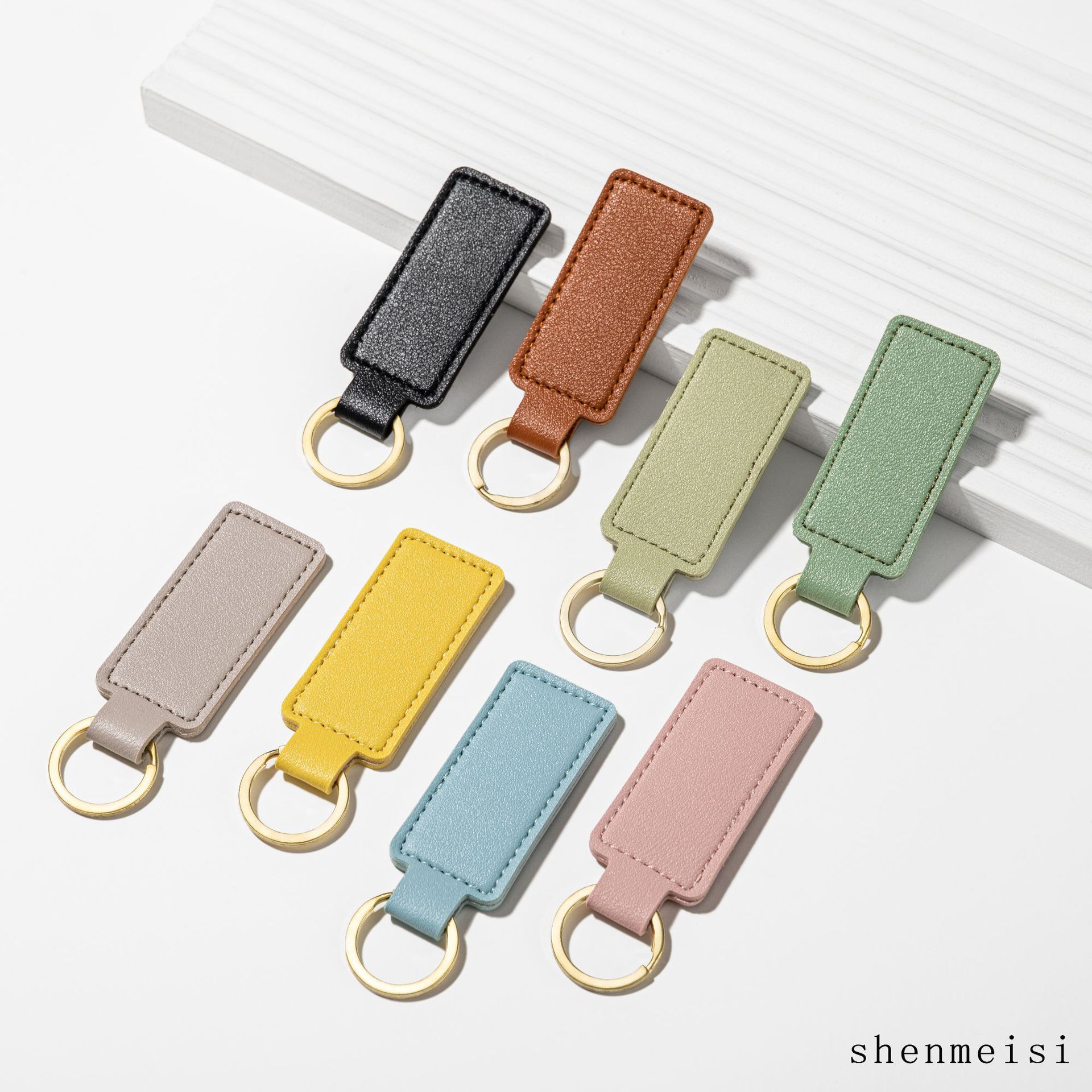 Keychain de cuero pu transfronterizo estilo simple hebilla cuadrada logotipo impresa colgante de cuero llavero para hombres y mujeres