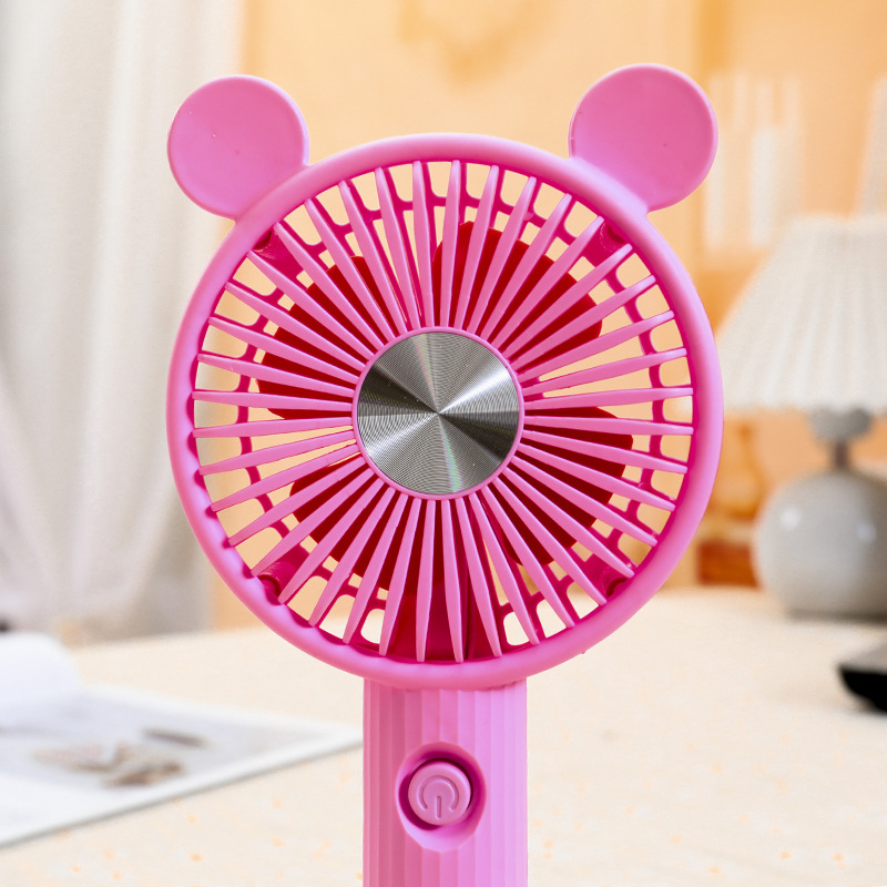 Cross-border new product cute cartoon round ear solid color base stand fan one-speed strong wind handheld charging fan