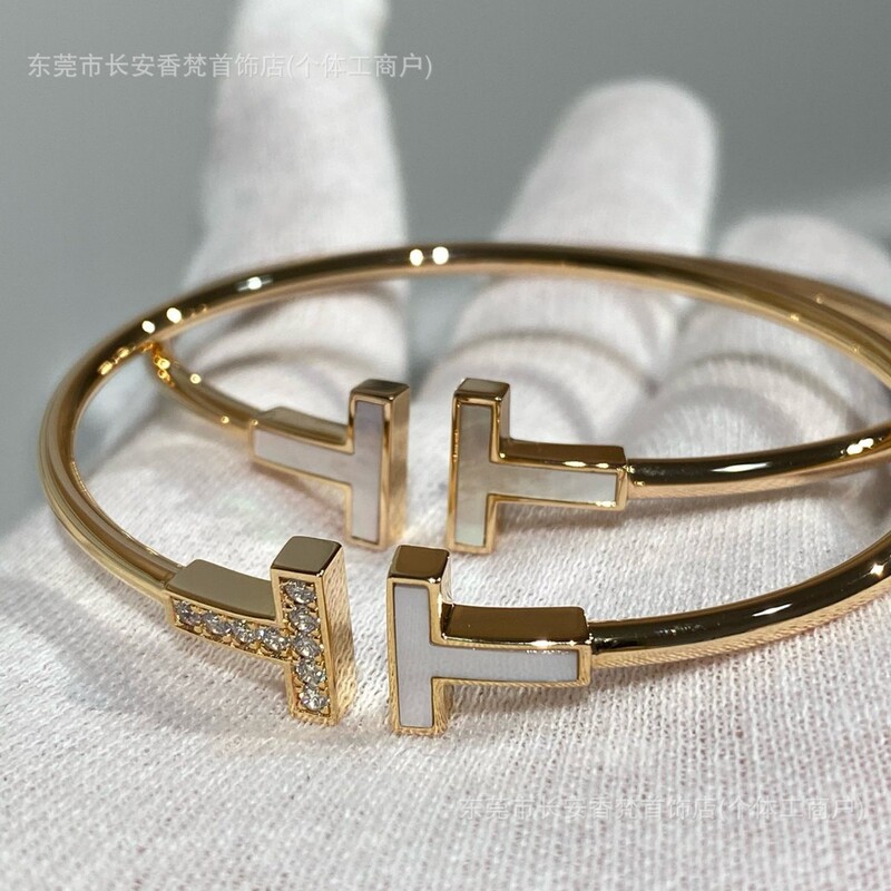 Fashionable and versatile classic double-T bracelet, 18K gold plated, light luxury ins style, white mother-of-pearl with half diamonds, T1 bracelet wholesale Fashionable and versatile classic double-T bracelet, 18K gold plated, light luxury ins style, white mother-of-pearl with half diamonds, T1 bracelet wholesale