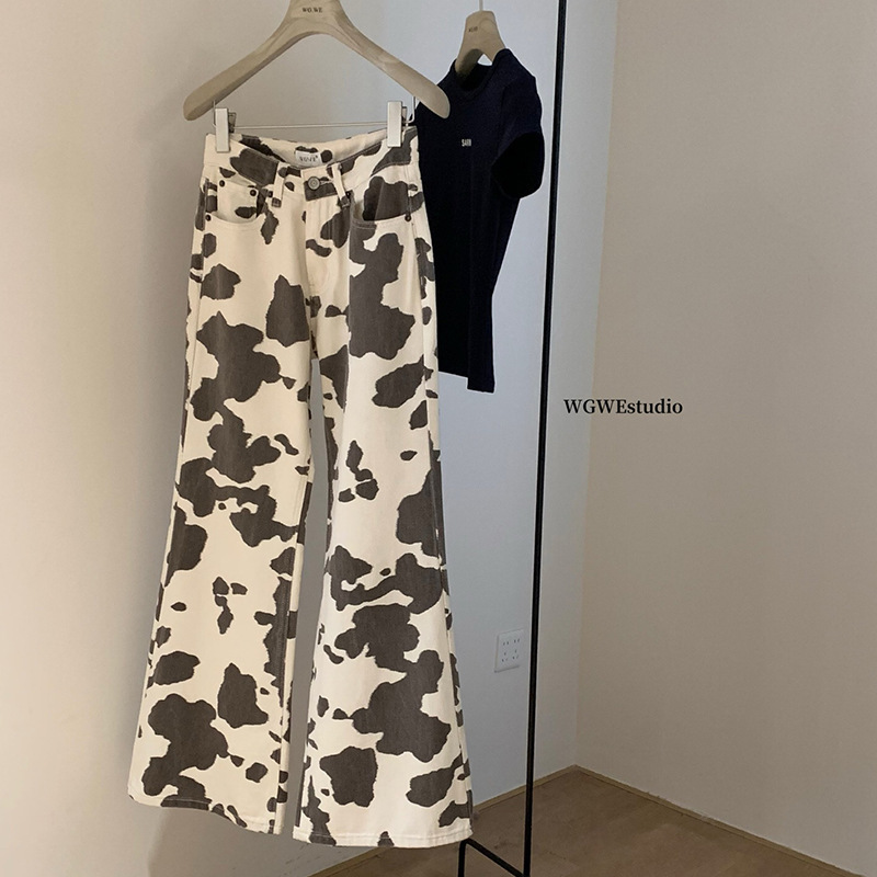 塞纳WGWE5162美式复古水洗奶牛斑纹微喇牛仔裤宽松阔腿长裤