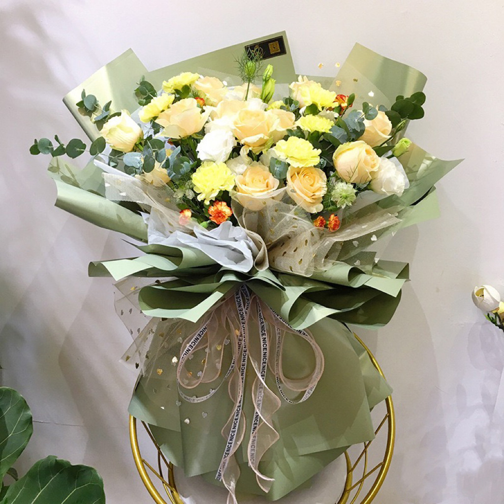 Nuevo papel de embalaje de luz dorada mágica de dos colores de doble cara impermeable papel de regalo de flores de Navidad en stock