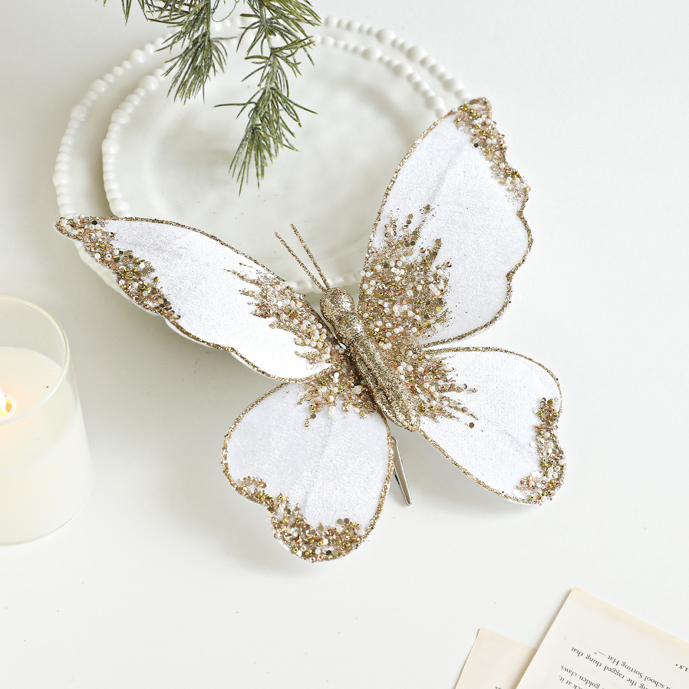 Nuevos productos de tela de alta calidad simulación de clip de arco de mariposa tela de vello polvo flocado árbol de Navidad decoración colgante diseño de escena