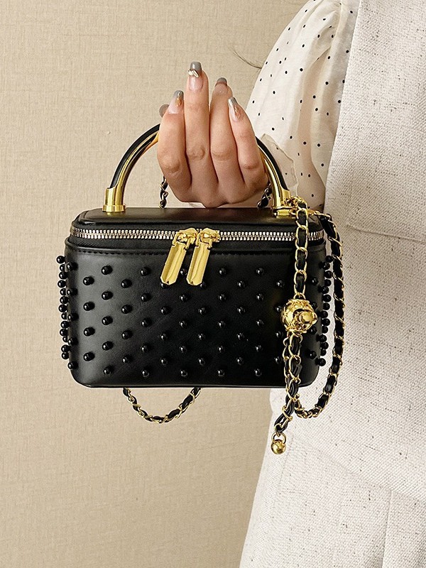Caja de mano de alta sensación, bolso cuadrado pequeño para mujeres 2026 nueva moda transfronteriza nicho de moda ligero de lujo cadena mochila