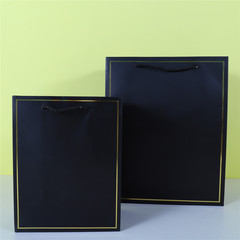 White pure color card packaging bag, single color gold foil border gift hand-held paper bag, wholesale white card black gift bag