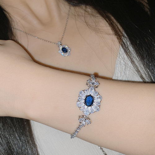 Versa jewelry fashion set gold-plated imitation tanzanite sapphire pendant 10*12 earrings live ring set of four