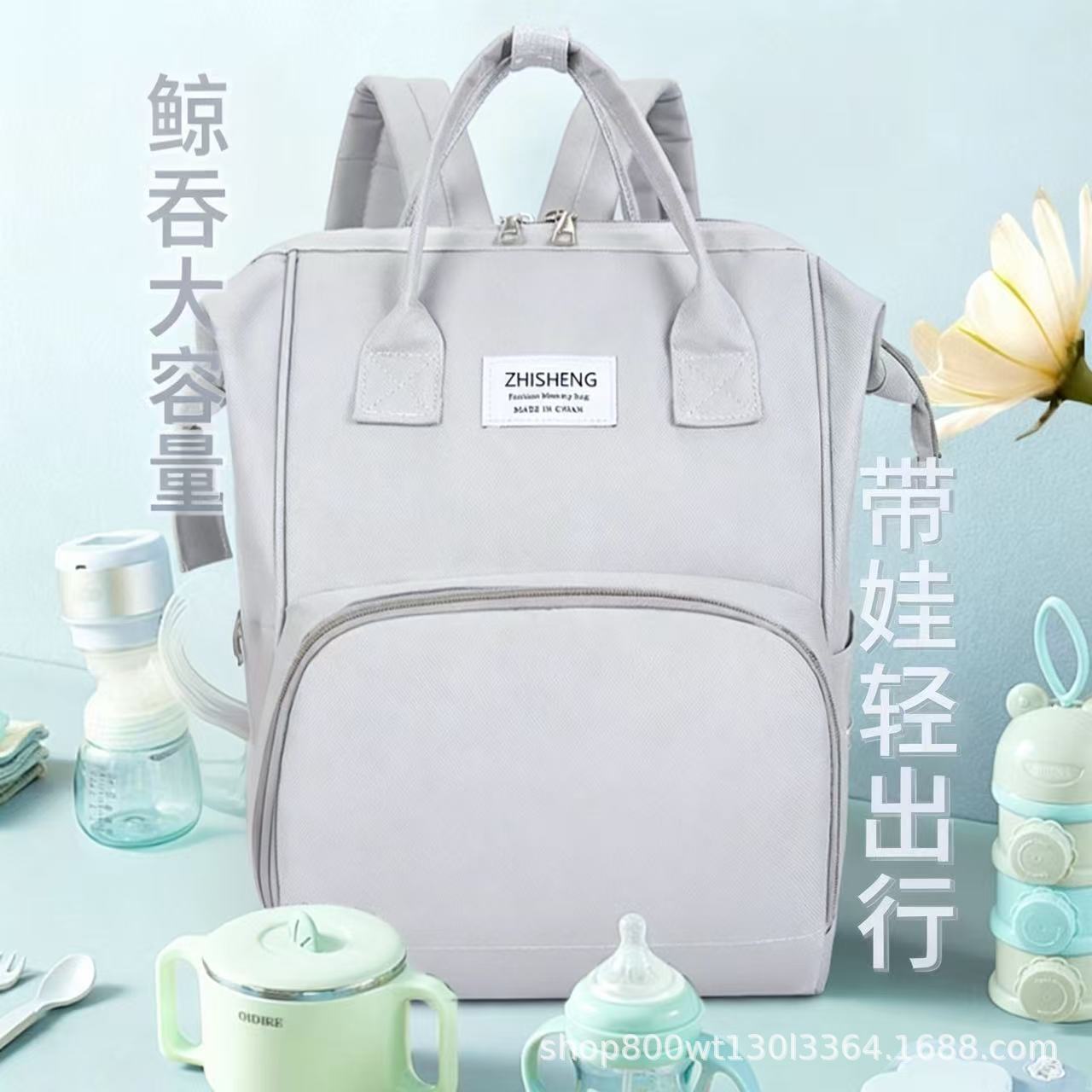 Transfronterizo nuevo bolso de mamá multifuncional portátil de mano ligero bolso de hombro madre-bebé de gran capacidad madre fuera mochila al por mayor