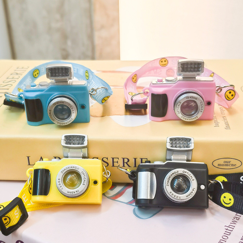 1688 cotton doll smiley face strap webbing luminous sound camera pendant puppy mini camera backpack bag