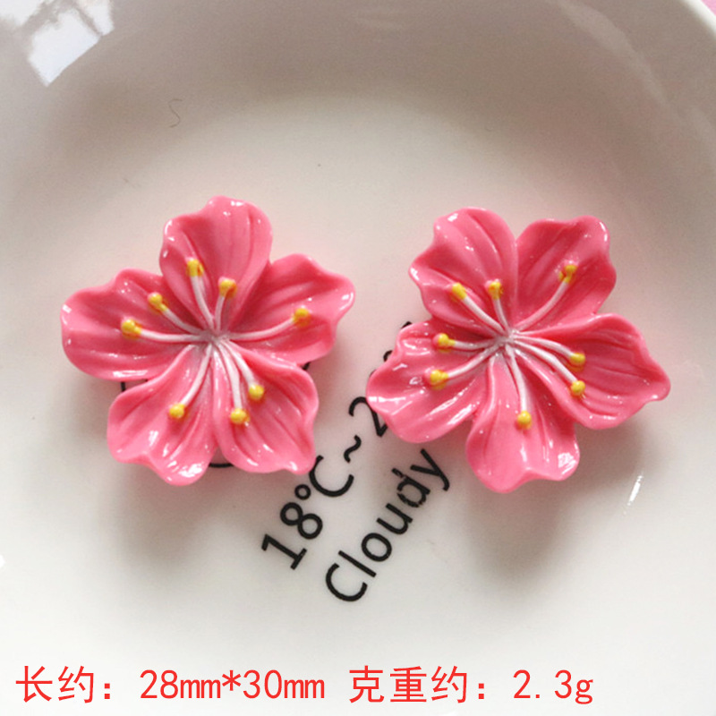 Nuevos accesorios de bricolaje de flor de durazno de resina rosa, zapatos con agujeros de pegamento de crema, fundas para teléfonos móviles, accesorios para el cabello, material de imán para refrigerador al por mayor