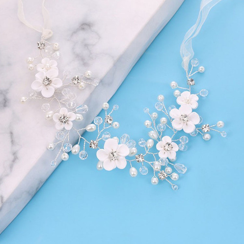 Korean-style bridal headpiece: Bohemian, fairy-like, handcrafted white flower and crystal gold hair comb—perfect accessory for wedding gowns and formal attire.