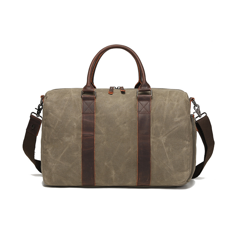 Nueva bolsa de viaje de tela de cera de aceite resistente al desgaste retro europea y americana color sólido bolsa de hombro al aire libre bolsa de almacenamiento al por mayor