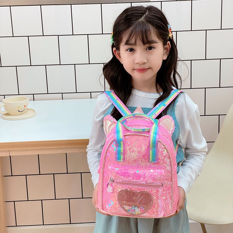 2025 nueva mochila infantil de moda esquinilla amor arena flotante mochila para niños y niñas mochila para niños jardín de infantes mochila pequeña