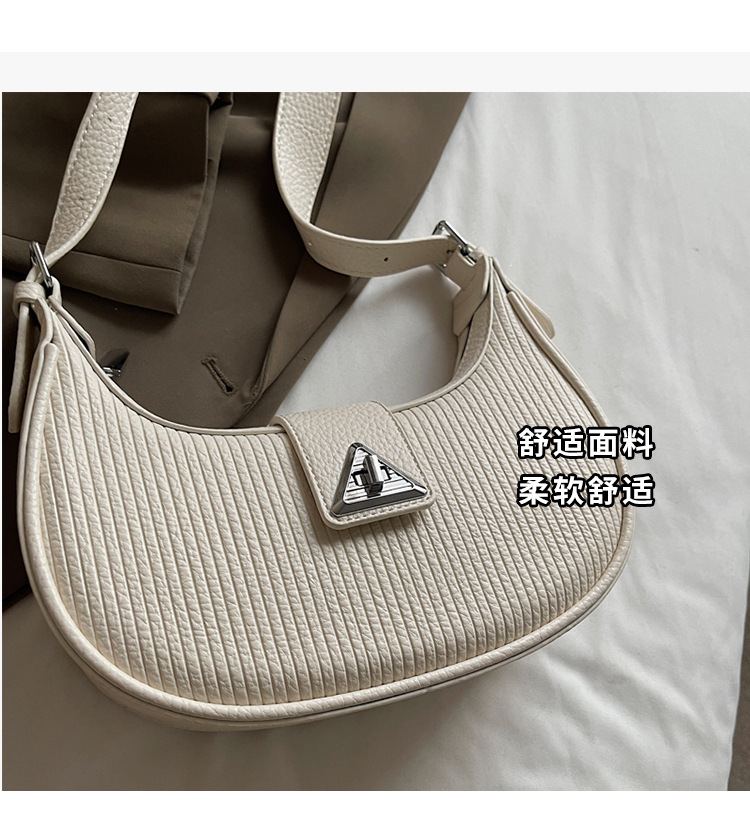 The 2025 new underarm bag for women is a simple and versatile single-shoulder crossbody bag. It is a popular and niche designer crescent-shaped women's bag undefined