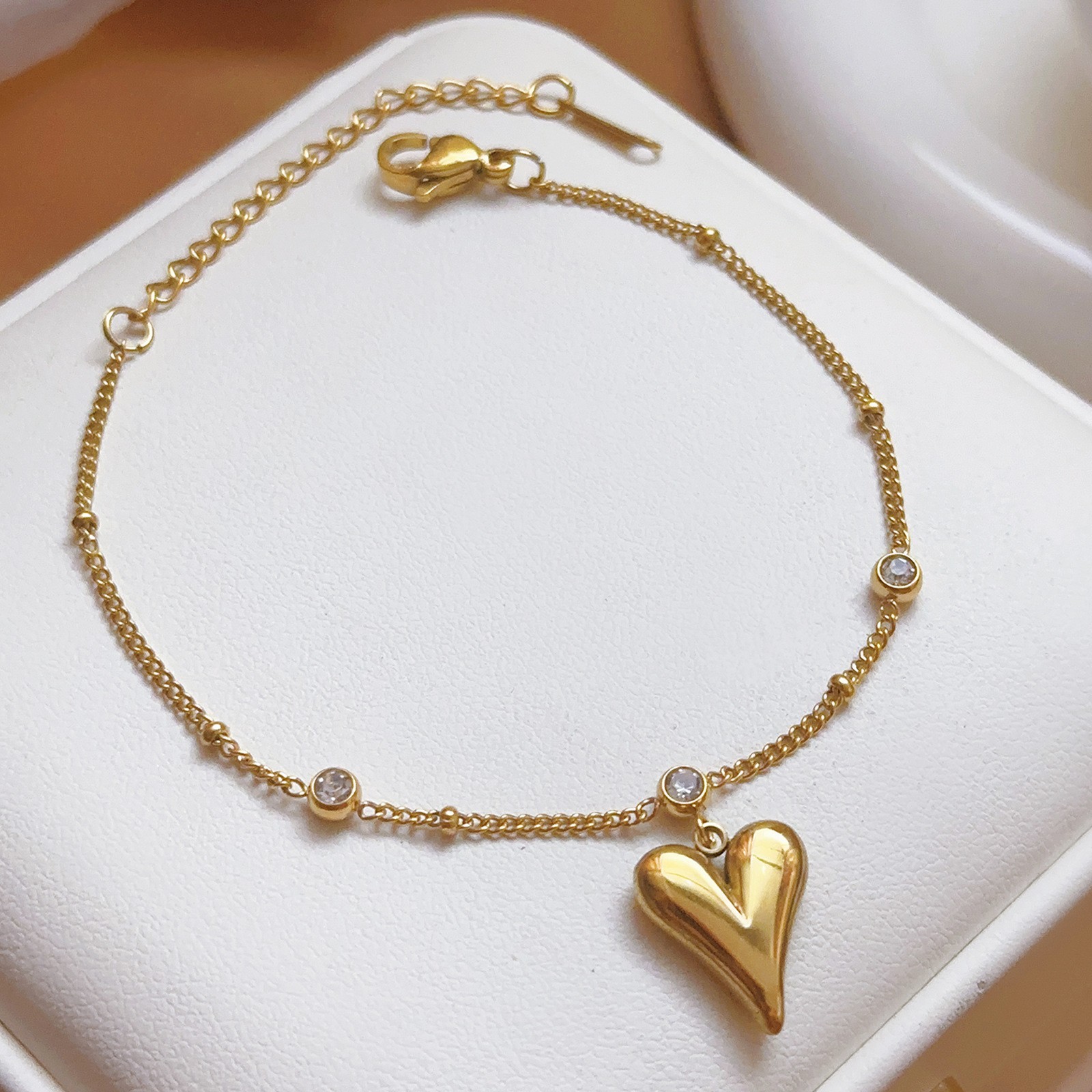 Pulsera de joyería de moda dorada de todo fósforo, lujo ligero, simple, nueva pulsera de acero de titanio que no se desvanece, trébol de cuatro hojas para mujer, transfronterizo