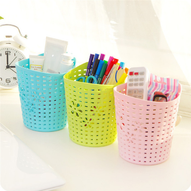 Casa de moda multiusos patrón hueco color caramelo pastoral pequeña flor cesta colgante tamaño pequeño almacenamiento en el hogar