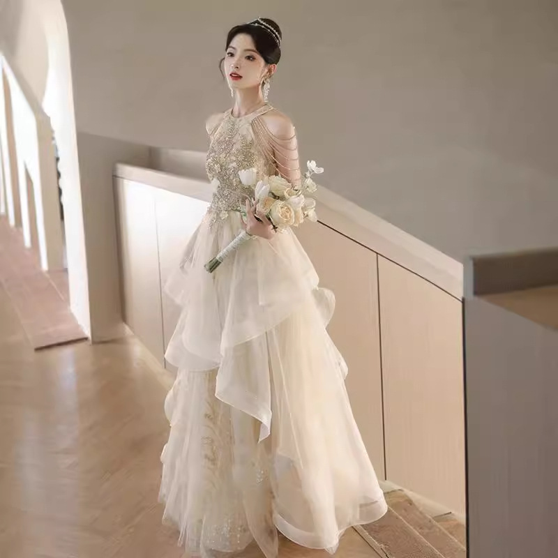 Vestido de noche de champagne temperamento de banquete de otoño anfitrión de alto nivel lujo nicho de gama alta vestido de examen de arte para adultos