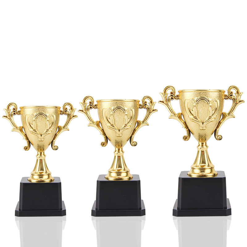 Trofeos de plástico escolares juegos infantiles juegos conmemorativos premios fútbol baloncesto bauhinia taza