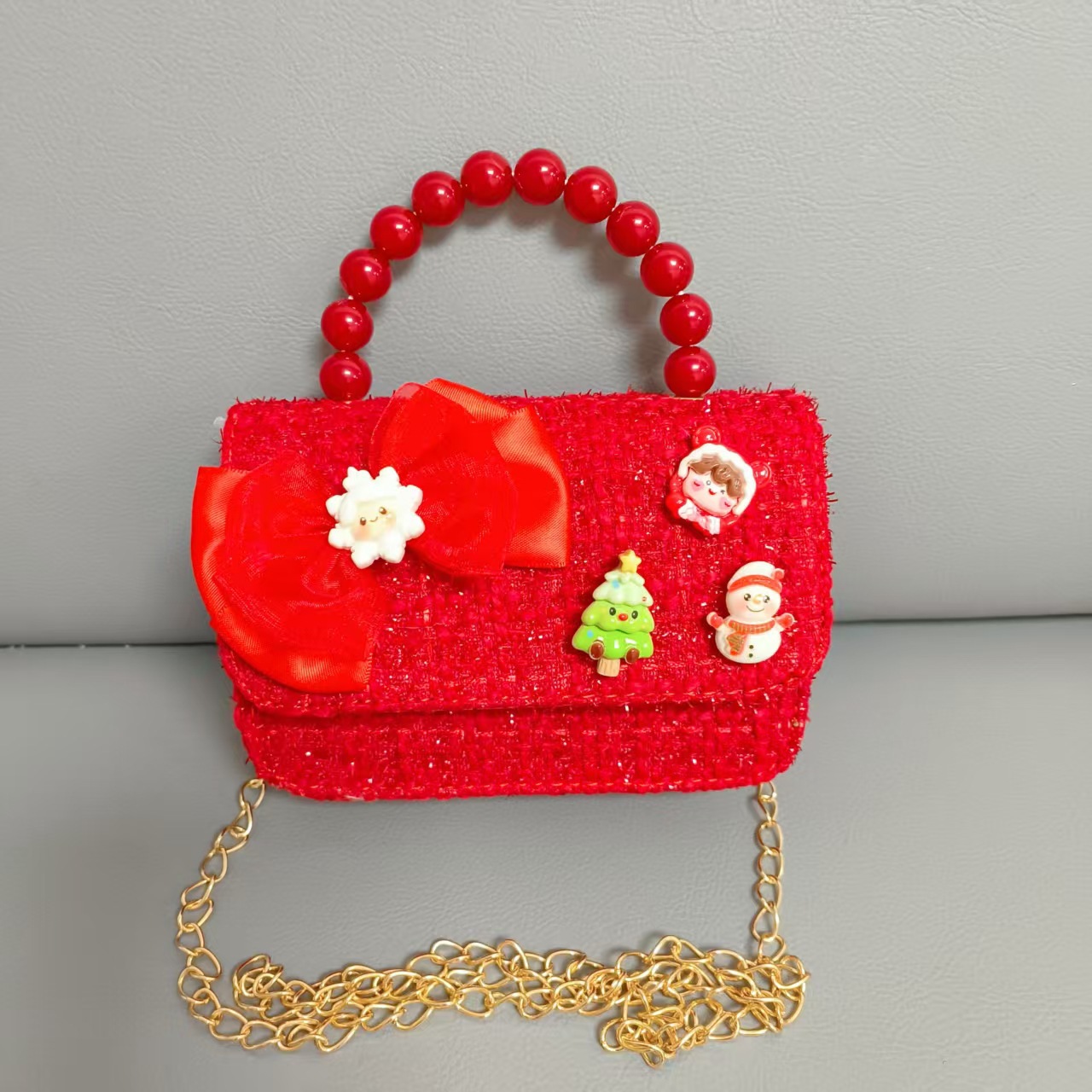 Cartera de Año Nuevo rojo arco de papá Noel bolso de perla pequeña cadena de viento fragante bolso de hombro