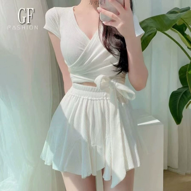 Split fitted supporting brand swimwear, high waist