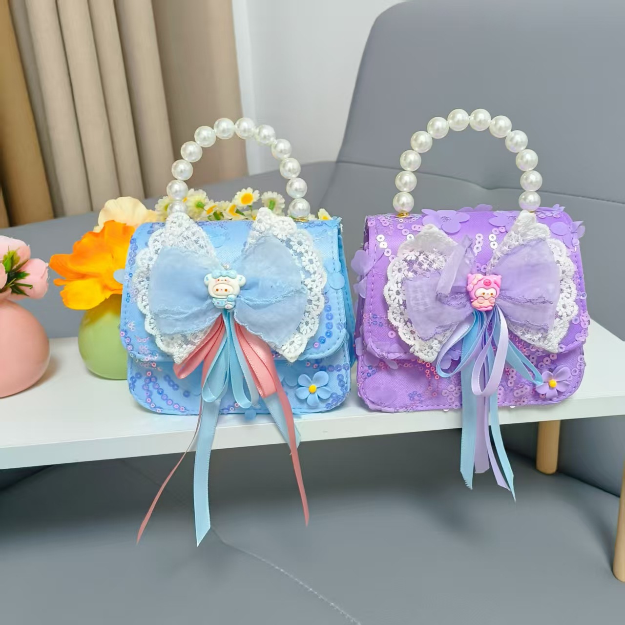 Bow princess pearl bolso Melody KT felino mochila accesorios de chicas pequeñas cadenas de viento fragante bolso para niños