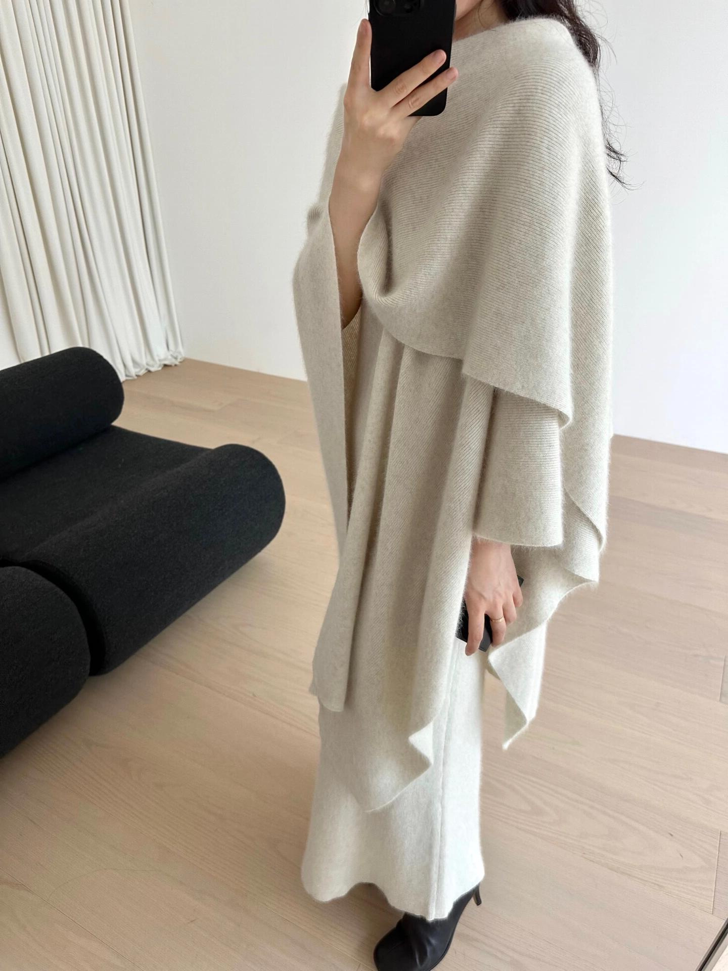 古いお金の風の高級感のニットのマントのショールのスーツの女性の春のフランスの復古の芸術は展のガーターのワンピースを見ます。
