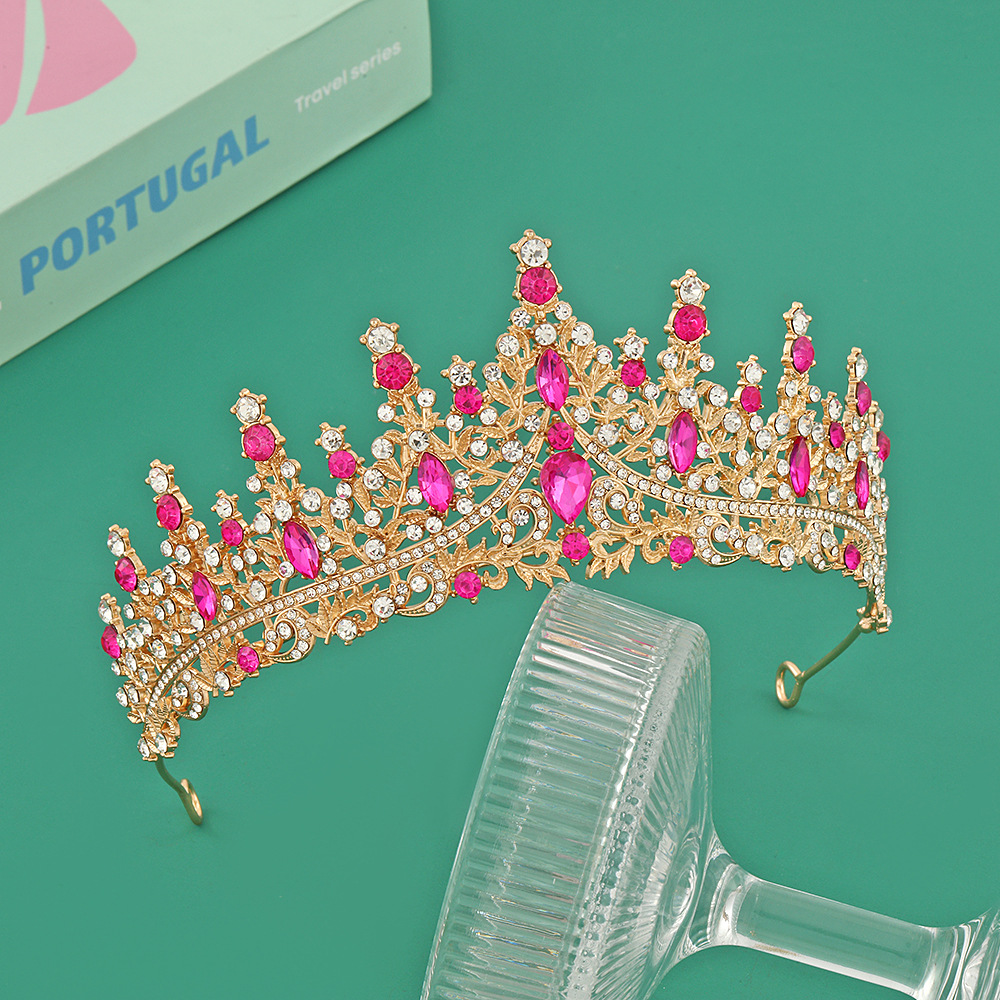 Corona de oro + diamante rosa