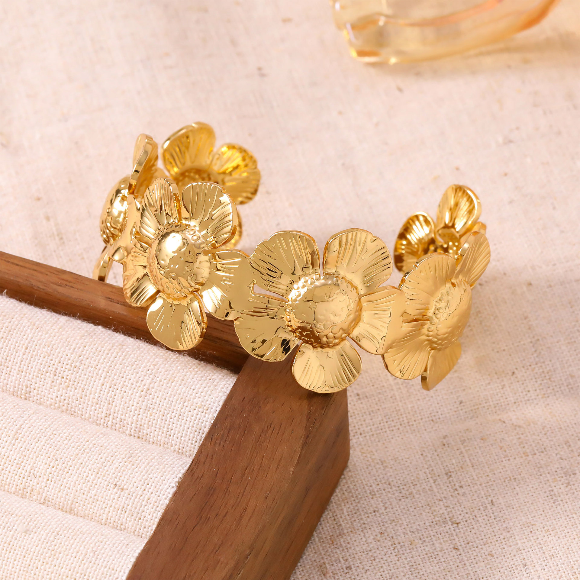 Golden three dimensional bracelet, flowered
