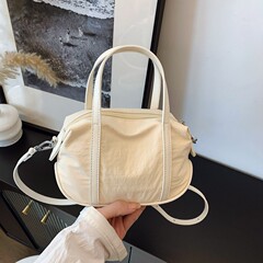 高品质小众设计轻便防泼水斜挎包女2025新款拼皮手机包百搭单肩包