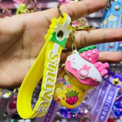 クリーム缶キーホルダー流砂液体ペンダント女性のオイルキャンディーカーキーバッグペンダント小さなギフト卸売