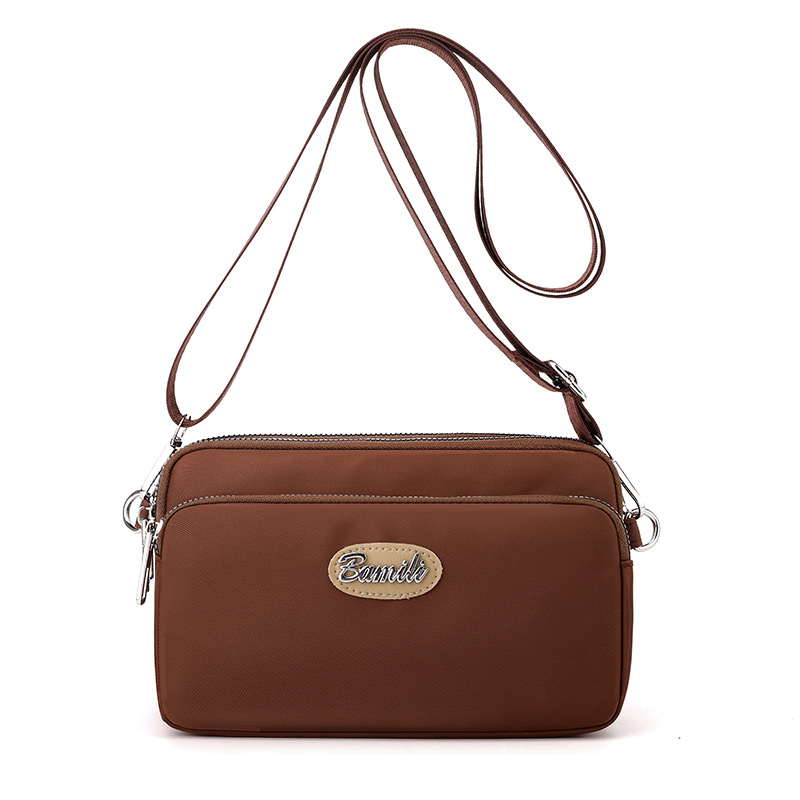 2025 nuevo estilo coreano moda transfronteriza todo fósforo Oxford tela bandolera bolso pequeño ligero casual de hombro para mujer