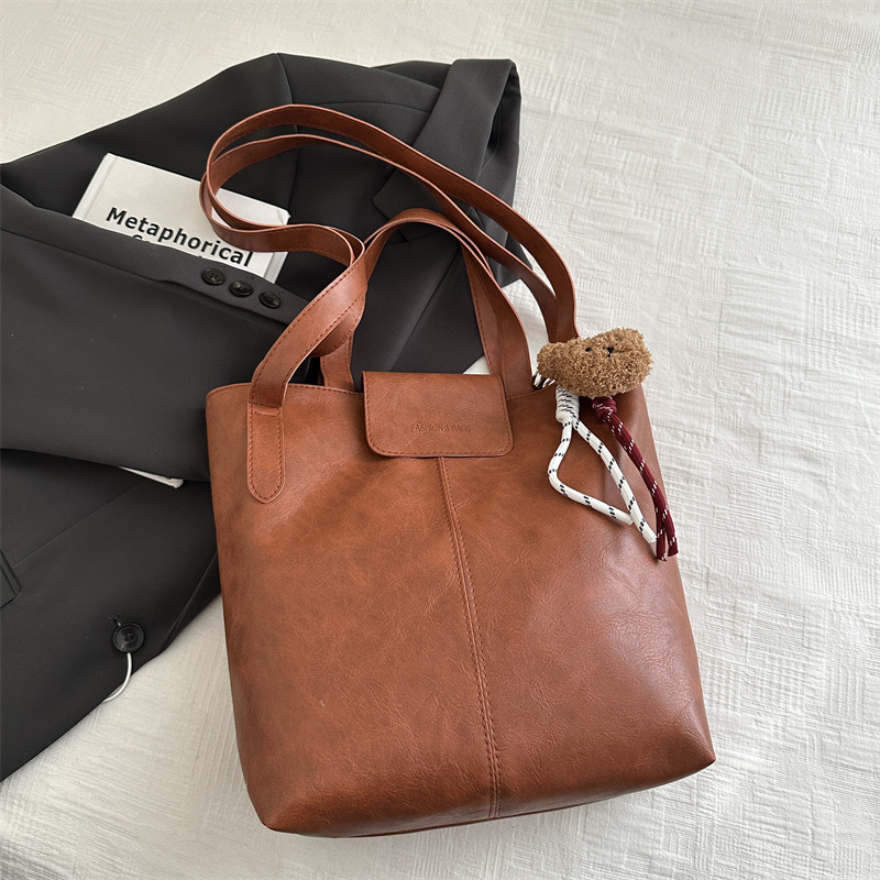 Alto sentido retro bolso de transporte de invierno 2024 nuevo versátil este año popular bolso de mano bolsa ocio