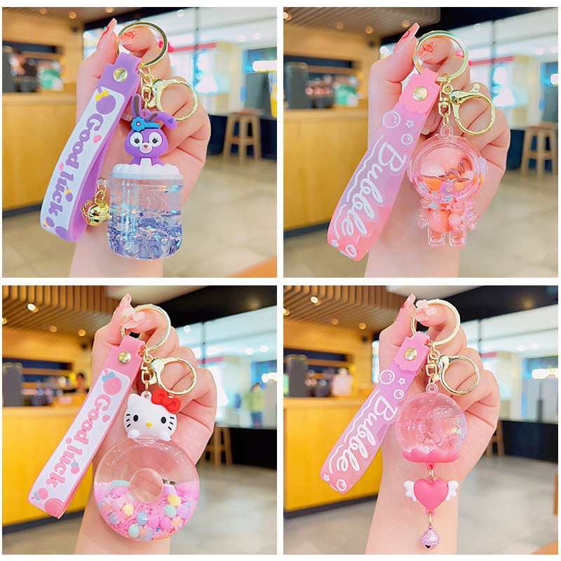 Acrylic quicksand bottle oil keychain gift wholesale schoolbag pendant doll cute quicksand pendant key chain
