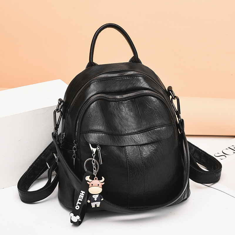 Mochila de cuero suave, mochila pequeña de viaje, mochila escolar de gran capacidad de doble uso, bolso de un solo hombro para mujeres de mediana edad.