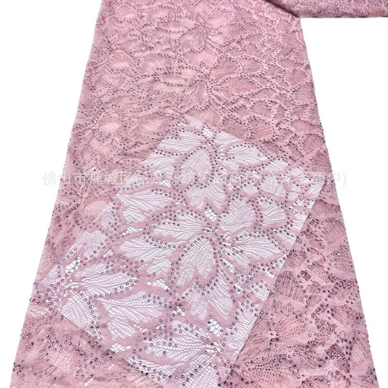 Nuevo hueco flor de encaje fondo tela de perforación caliente pesada cola de pez vestido de boda vestido de noche brindis tela spot