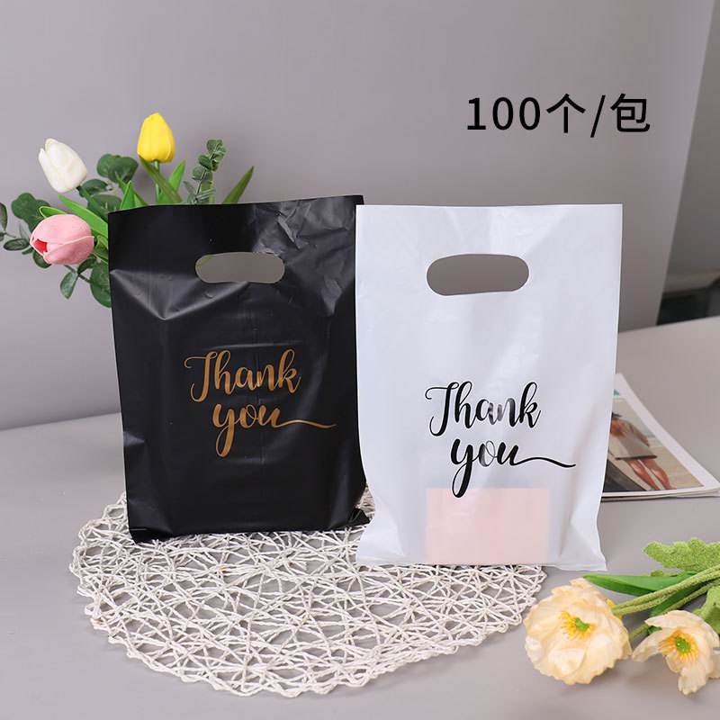In stock wholesale gift packaging bag four-finger flat pocket cross-border gratitude handbag clothing bag cosmetics jewelry bag In stock wholesale gift packaging bag four-finger flat pocket cross-border gratitude handbag clothing bag cosmetics jewelry bag