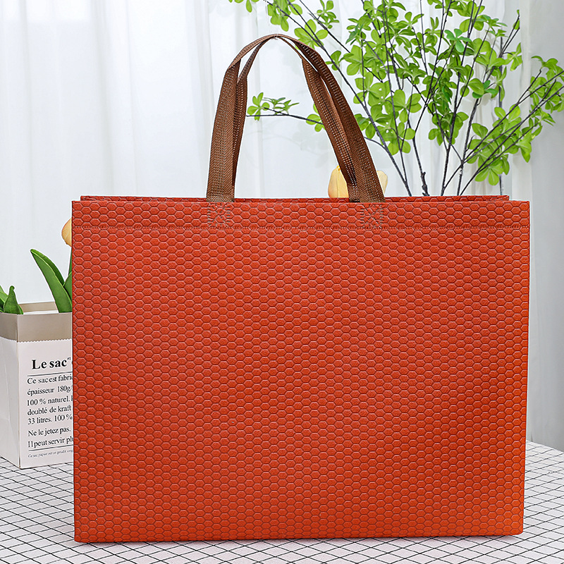 Bronce en relieve con puntos ondulados; alto 27 ancho 32 lados 10