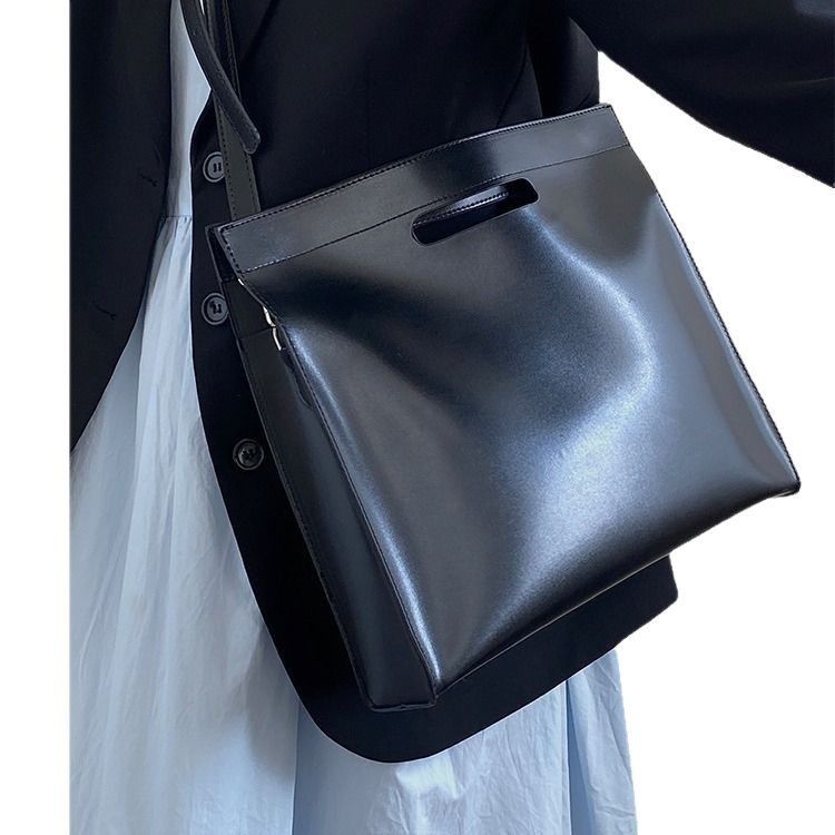 Bolso de explosión transfronteriza, bolso de computadora, bolso de trabajo, bolso de archivo de viaje, bolso de hombro de nicho