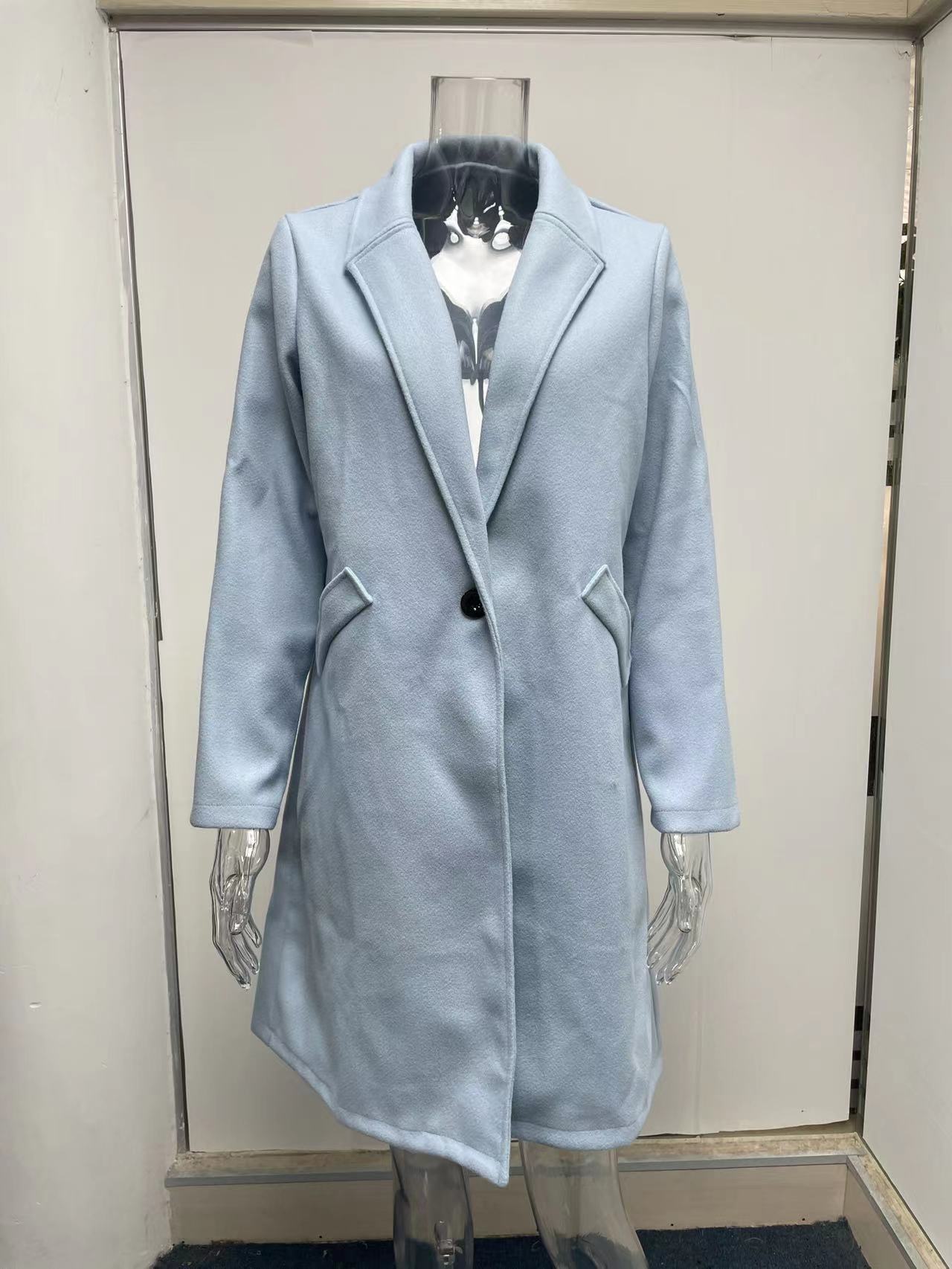 Title 2, Mid-length coat with solid lapels. Classic styl...