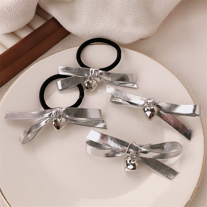 Coreano dulce cool girl plateado arco de cabello en nicho de alta sensación cuerda de cabello amor correa de cabello adornos para el cabello
