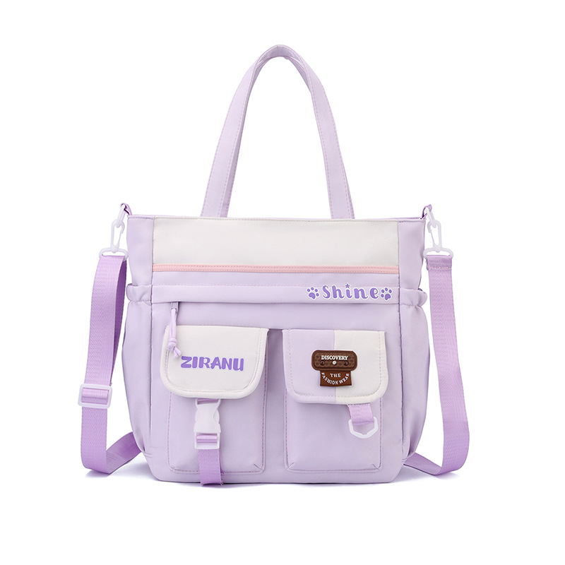 Mochila escolar transfronteriza para niñas, versión coreana elegante, gran capacidad, ligera, que reduce la carga y protege la columna vertebral, mochila de doble asa para estudiantes de secundaria.