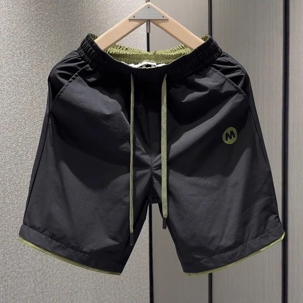 Pantalones de cinco puntos de estilo fino de la marca de moda, pantalones casuales, pantalones cortos para hombres, pantalones deportivos coreanos de secado rápido de verano