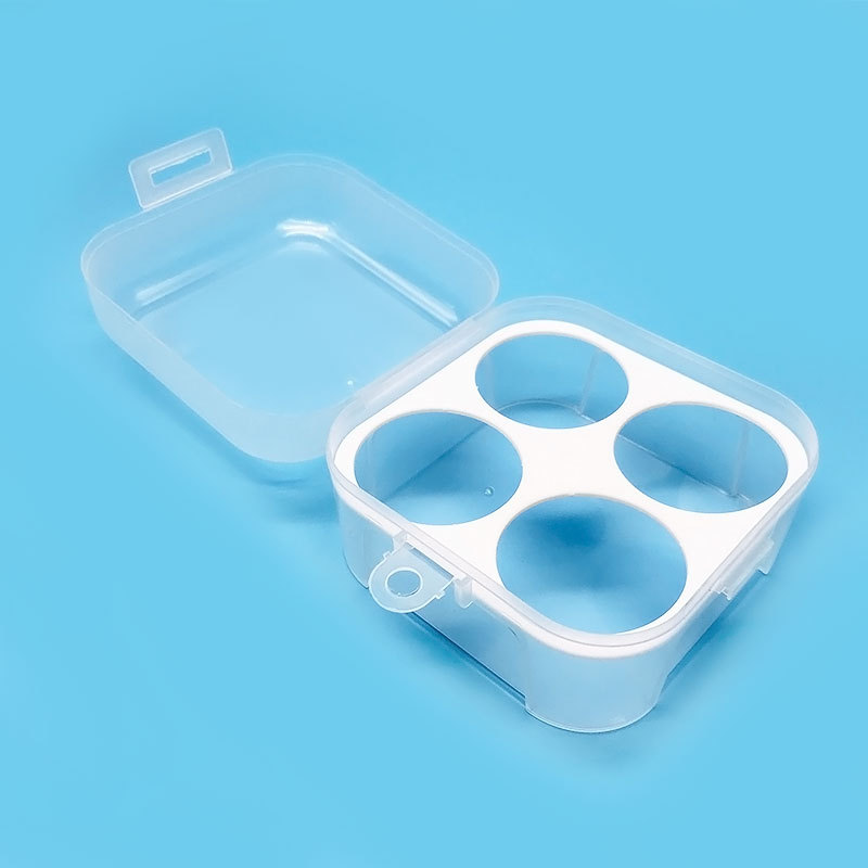 Caja de huevo popular en línea traje de huevo de belleza caja de almacenamiento de 4 rejillas esponja de calabaza huevo caja vacía transparente en stock suministro