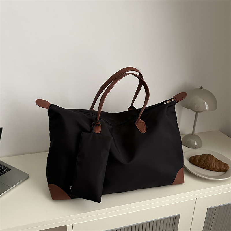 Bolsa de viaje para mujeres 2024 nueva sensación de alto nivel bolsas de bolsas de viajes portátiles bolsas de bolsas de moda de hombro de gran capacidad para mamá