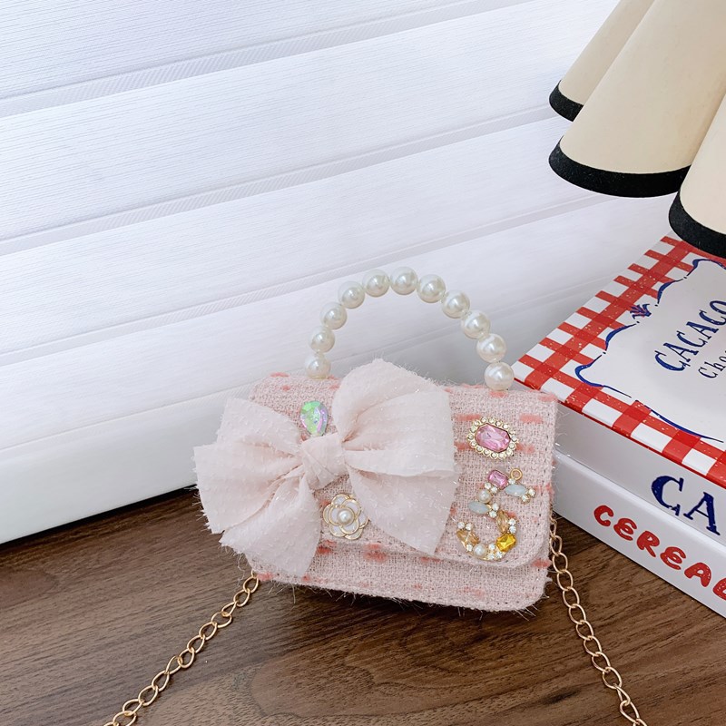 Bolsos para niños bolso de hombro lindo para mujer bolso de mensajero de perlas con lazo de moda princesa bolso de niña de estilo occidental